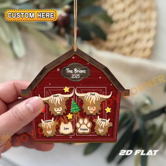 Personalized Christmas ornament with family names on a red house-shaped background.