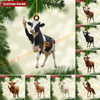 Collage of animal ornaments with customizable name tags, including a cow, horse, and other animals, against a green leafy background.