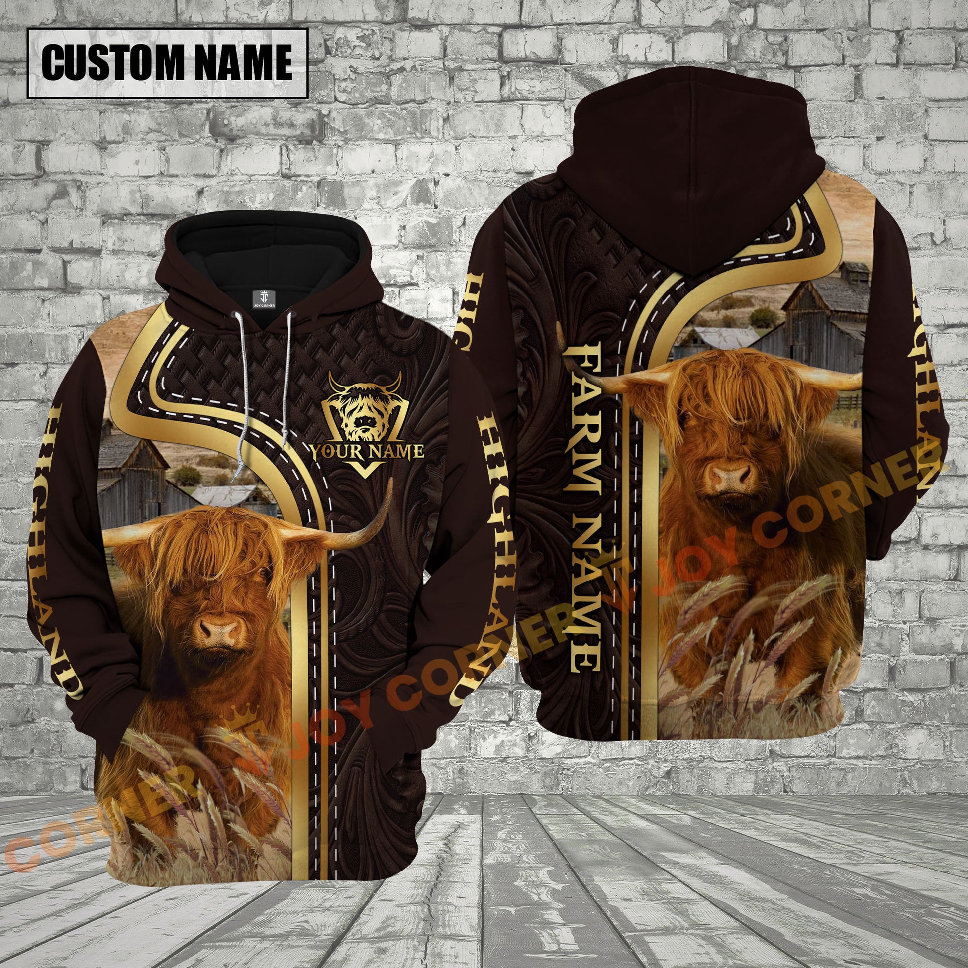 Hoodie with Highland cow design and customizable text on a brick wall background