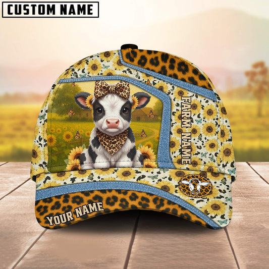 Cap with cow design and sunflower pattern on a wooden surface with blurred background