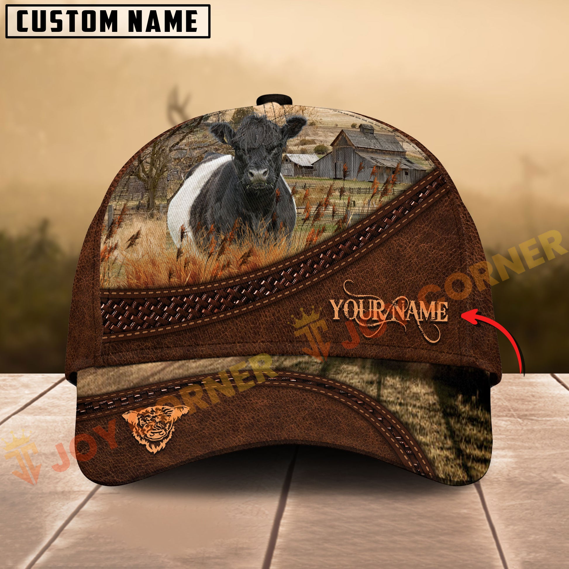 Cap with cow design and customizable text on a wooden surface