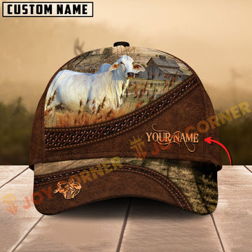 Customizable cap with cow design and 'Your Name' text on a wooden surface.