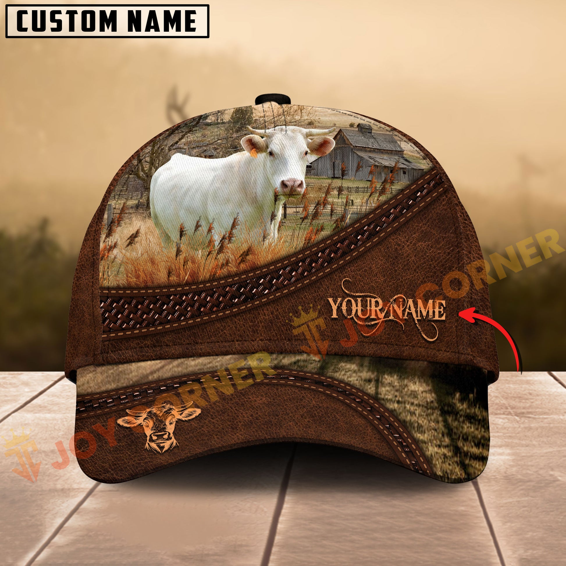 Cap with cow design and customizable text on a wooden surface