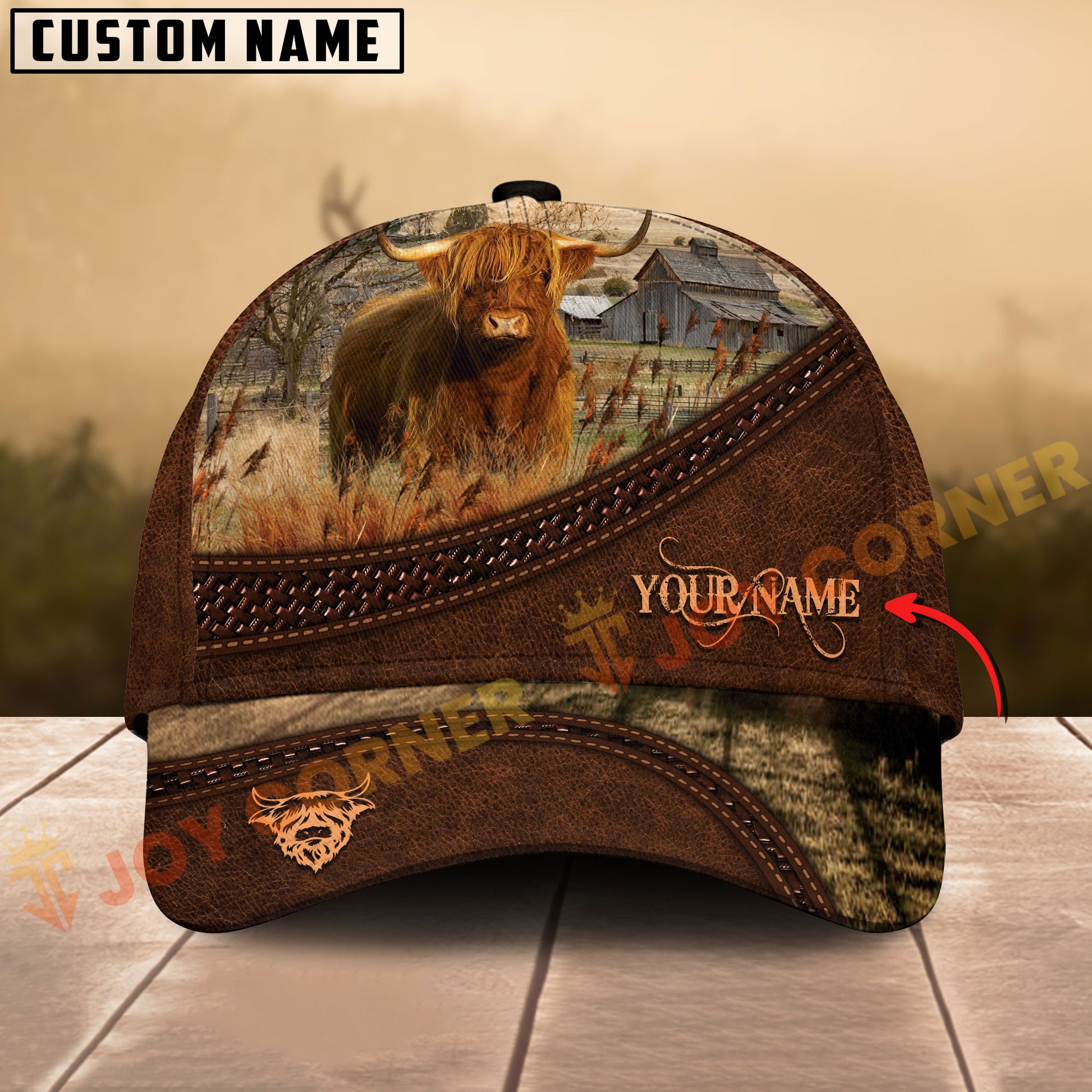 Customizable cap with a cow design on a wooden surface, featuring the brand 'Joy Corner'.