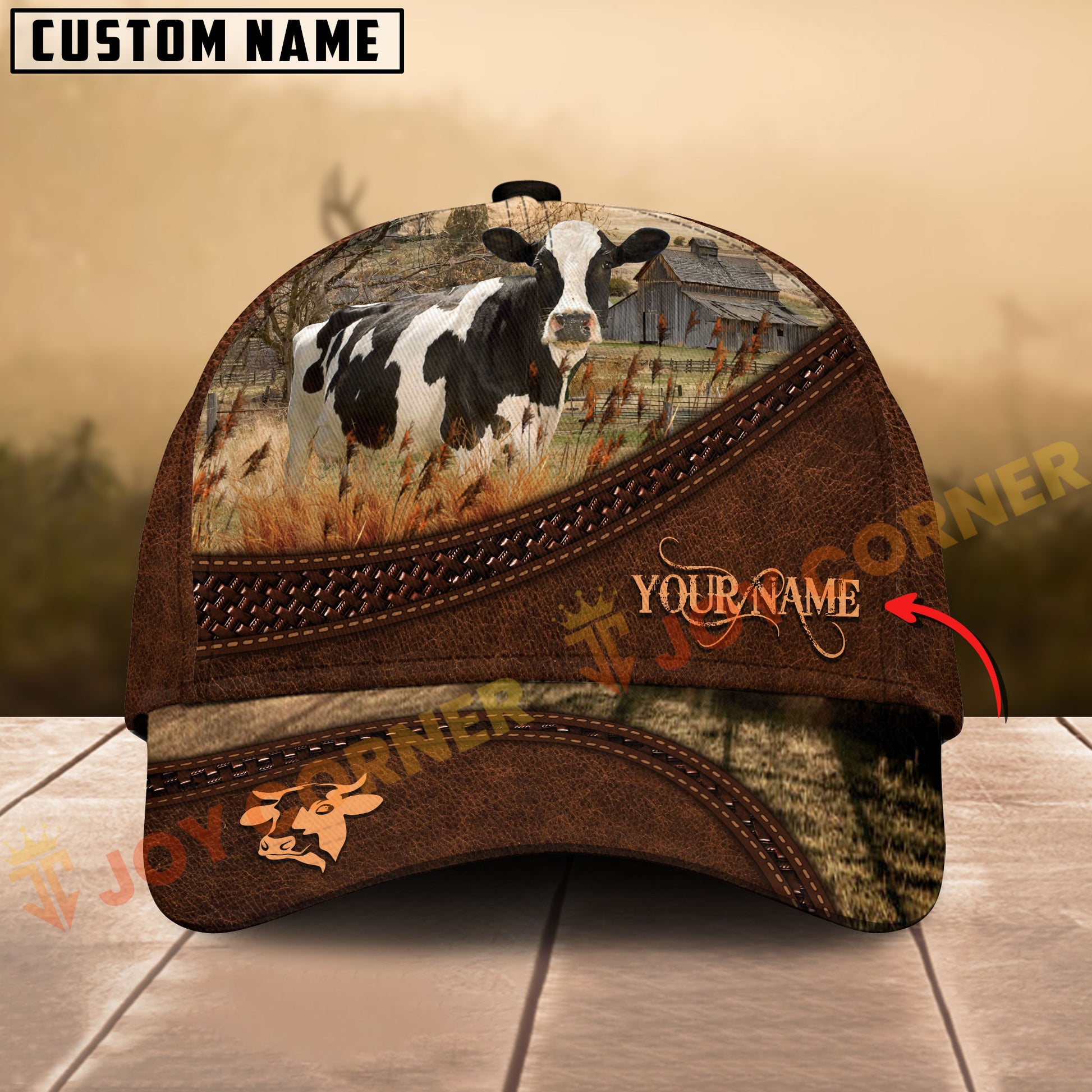 Cap with cow design and customizable text on a wooden surface