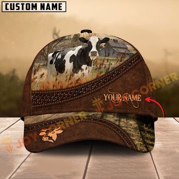 Cap with cow design and customizable text on a wooden surface