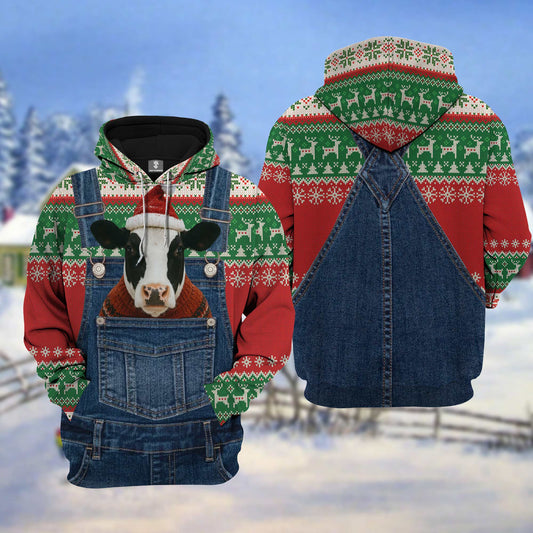 Hoodie with a cow design and festive pattern in a snowy landscape