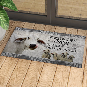 Joycorners Brahman Cattle "You Don't Have To Be Crazy To Live Here We Will Train You" Doormat